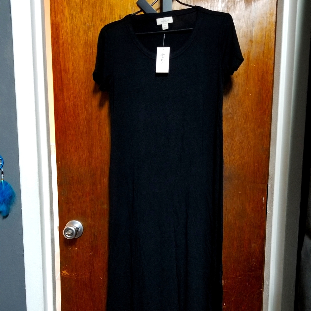 Stretchy black dress with sides cut